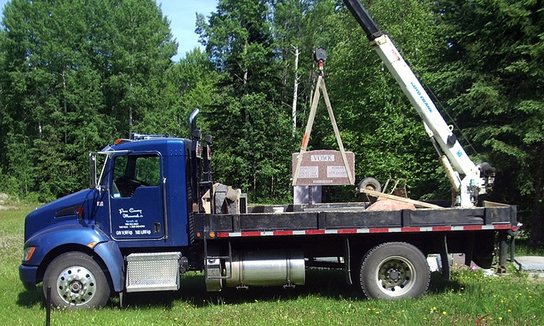 Peace Memorial Truck Installing Memorial Monument